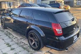 Image result for Brilliant Black 2009 Magnum