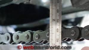 Measure a motorcycle chain by first measuring the overall length, hen measure the individual links by measuring the distance between the roller. How To Adjust A Motorcycle Chain Webbikeworld