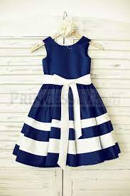 Navy blue has been a hot wedding color for the past few years and still will be a trendy wedding color for 2020. Navy Blue Satin Ivory Striped Flower Girl Dress Flower Girl Dresses Taffeta Tea Length Flower Girl Dress Girls Dresses