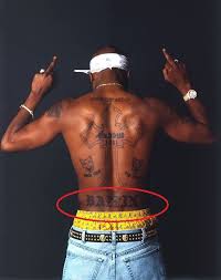 Tupac shakur was just 18 years old when he got his first '2pac' tattoo on the left side of his chest. Tupac Shakur S 21 Tattoos Their Meanings Body Art Guru