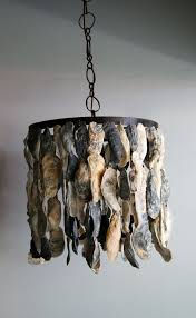 Maybe you would like to learn more about one of these? Ilovechartreuse Eastern Shore Oyster Shell Chandelier Oyster Shell Crafts Shell Crafts Seashell Crafts