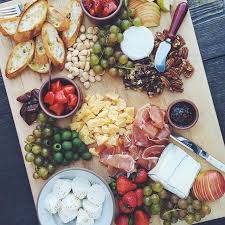 Entertaining frequently includes cheese platters or trays, often with fruit or vegetables or meat or a combination of these foods. Cheese Board With Fruit Nuts Olives And Prosciutto By Valleybrinkroad Quick Easy Recipe The Feedfeed