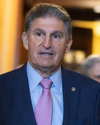 Schumer, countering Manchin, vows Senate vote