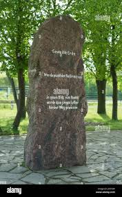 Memorial stone for Martin Luther with inscription Geweihte Erde, place of  Luther's monastic vows, Lutherstätte, Erfurt Stock Photo
