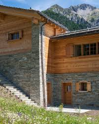 Natursteinmauerwerk Als Fassadenverkleidung Fur Chalet Fassadenverkleidung Natursteinfassade Fassade