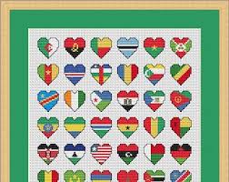 Comes complete with pattern cover, fully detailed color chart with 200 flags of the world each depicted in a 1 inch heart shape to make this amazingly detailed chart supplied as a full colour pdf cross stitch pattern via email. Flags Of The World Cross Stitch Chart By Hollyshobbiesuk On Etsy Cross Stitch Chart Cross Stitch Cross Stitch Patterns