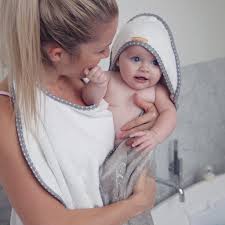 Its innovative design gives you both hands free to safely bath, lift and wrap your baby, keeping baby warm and you dry. Award Winning Cuddledry Apron Style Hooded Baby Towel Makes Bathing New Baby Safe And Easy Recommended For Newborn Perfect Baby Gift