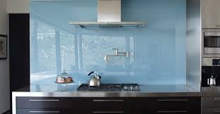 They have tools to lift the glass and place it without snapping it or scratching it while it goes in. Try The Trend Solid Glass Backsplashes