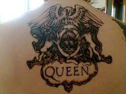 A cool freddie face silhouette. Black Ink Queen Band Tattoo On Upper Back Band Tattoo Queen Tattoo Tattoos