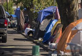 Two persons of interest have been detained and authorities are. Vancouver Officials Tour Growing Tent City The Columbian