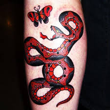 If you like tattoos with meanings that represent birth, and you also want some flowers this tattoo can have a positive meaning, but it can also look pretty negative and scary in some other cultures. Snake Tattoos 30 Scary Collections Design Press