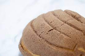 Premium Photo | Close-up of traditional mexican conchas topping on ...
