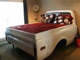 Take Tailgate Off Truck And Mount On Wall As Headboard Make Cab Of Truck Footboard And Put A Desk Und Car Part Furniture Automotive Furniture Automotive Decor