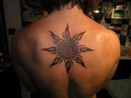 Sun Tattoos Meanings Pictures Designs And Ideas Sun Tattoo Tribal Sun Tattoo Designs Tribal Tattoo Designs