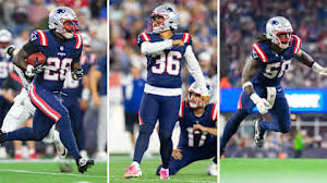New England Patriots players preparing for a preseason game