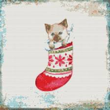 Can you imagine anything more inviting than these festive stockings hanging in your home? Kitten In Christmas Stocking Cross Stitch Pattern Avaloncrossstitch Cross Stitch Pattern Kitten