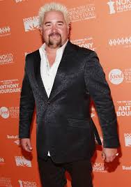 Guy Fieri He Should Be As Big As A House But He S Not He Really Likes To Eat Actually Tried Some Of H Guy Fieri Guy Fieri Flame Shirt Celebrity Chefs