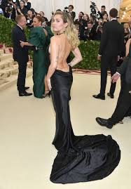 Miley cyrus voiced a character in one of the credit scenes. Miley Cyrus Met Gala Dress 2018 See Miley Cyrus S Low Cut Met Gala Gown