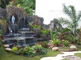 Lawn is also a great surrounding to a backyard's pond. Grotto Designs
