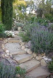 A rustic walkway of irregular bluestone and a garden space heavily dependant upon texture: Landscape Glass Home Depot Landscape Ideas