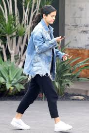 Black And Blue Split Denim Jacket Selena Gomez Wore An Oversized Denim Jacket And Black Jogger Pants While Out In L A Oversized Denim Jacket Outfit Oversized Denim Jacket Jacket Outfit Women
