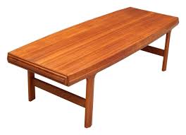 Teak root coffee table would make for a beautiful conversation starter in your rising barn. Swedish Mid Century Modern Teak Coffee Table With Hidden Side Drawers Andrew Wilder Gallery