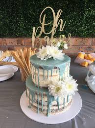 Then repeat the process with the smaller of the baby shower cakes and place on a thin, round cake board. Cute Baby Shower Cake Boy Buttercream Novocom Top