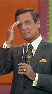 Bob Barker messes around with announcer Johnny Olson