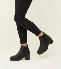 This chelsea ankle boots designed to be easy on and off with an inner zipper and outer elastic, more these black ankle booties are super cute and stylish, goes well with skinny jeans, boot cut they do fit perfect with boot socks but nothing thick since they don't really have much wiggle room. Black Leather Look Chunky Chelsea Boots New Look