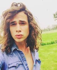 However, men with coiled curls can too. Young Men Wavy Long Hairstyles Photograph Long Hair Styles Men Curly Hair Men Mens Hairstyles