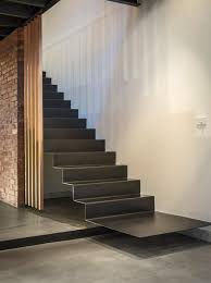 Steel stair with stringer only on one side with cantilever treads connected to glass. Design Is In The Details 10 Cantilevered Stair Designs Studio Mm Architect