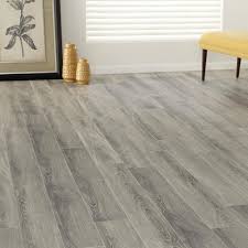 You may want your lower level to match the design of your living room. Gray Laminate Flooring Basement Laminate Flooring