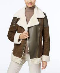 Soft And Fuzzy On The Inside And Perfectly Stylish On The Outside This Faux Shearling Coat From Michael Micha Faux Shearling Coat Michael Kors Coats Shearling