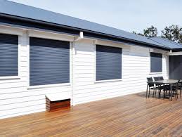 Modern window with security shutters and decorative steel bars. Window Security Shutters Statewide Security Doors