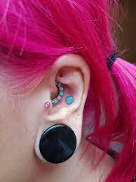 Curated Ear Project With A Bubble Gum Theme Tragus Piercing Using A Pink Opal From Neometal Conch Piercing Using A W Conch Piercing Piercing Neometal Jewelry