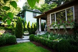Here are 10 hardworking evergreen shrubs and small trees to use as garden hedgers and edgers. 9 Low Growing Hedges That Make Good Neighbors