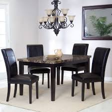 Create a space that welcomes you and your guest and makes each moment a special occasion. How To Select Black Dining Table And Chairs Designalls Dining Room Table Set Contemporary Decor Living Room Black Dining Room