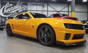 Offered on ss coupes with manual transmissions, the 1le package features unique gearing 2014 chevrolet transformers 4 bumblebee camaro pictures, photos, wallpapers and videos. Four Bumblebee Chevrolet Camaros Command 500 000 At Barrett Jackson Auction