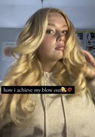 Blows Hair Out of Face