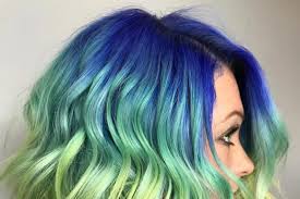 This blue green hairstyle reminds us of mermaid's hair. Mermaid Melt Is The Dreamiest Summer Hair Color Allure