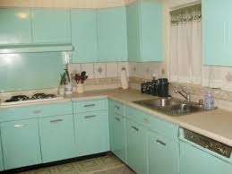 General electric metal kitchen cabinets retro redhead. Google Image Result For Http Uglyhousephotos Com Wordpress Wp Content Uploads 2010 10 101027lasc Retro Kitchen Metal Kitchen Cabinets Steel Kitchen Cabinets