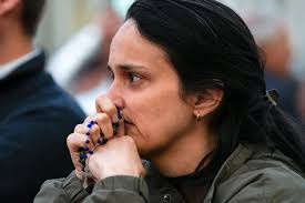 Catholic News Service added a new...