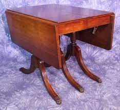 It is available with four armless chairs that include soft and relaxing seat. 1930 Duncan Phyfe Antique Mahogany Drop Leaf Dining Table Console Sofa Vint Antique Dining Room Furniture Antique Drop Leaf Dining Table Drop Leaf Dining Table