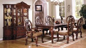 This table suggests a country/cottage style. Tuscany Ii Elegant Antique Cherry Formal Dining Set With French Style Legs Cm3845ch