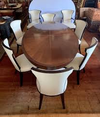 4 side chairs, 2 arm chairs and a buffet with ornamental carvings on all pieces. Barbara Barry For Henredon Celestial Dining Room Nine Piece Set Table 8 Chairs At 1stdibs