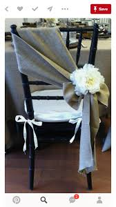 I Mean I Wouldn T Let Burlap Anywhere Near My Wedding But This Is A Nice Way To Dress Up Chiava Wedding Chair Decorations Wedding Chairs Rustic Wedding Details