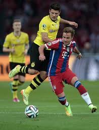 Mario Goetze Of Bayern Muenchen Battles For The Ball With Milos Jojic Mario Gotze Bayern Munchen Bayern