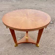 Featuring a refined marquetry top and brushed brass base, this elegant coffee table is the perfect fusion of classic craftsmanship and modern design. Andre Arbus Lemon Tree Marquetry Bronze Accent Coffee Table Tables Items By Category European Antiques Decorative