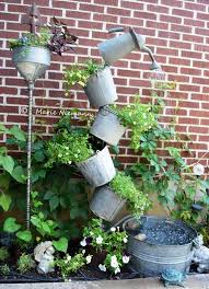 Outdoors, a water fountain brings soothing sounds and attracts wildlife. Marie S Tipsy Solar Fountain Flea Market Gardening