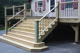 new deck built by ryan kelley with pressure treated wood and latitudes capricorn koa composite decking wood deck steps deck steps treated wood deck